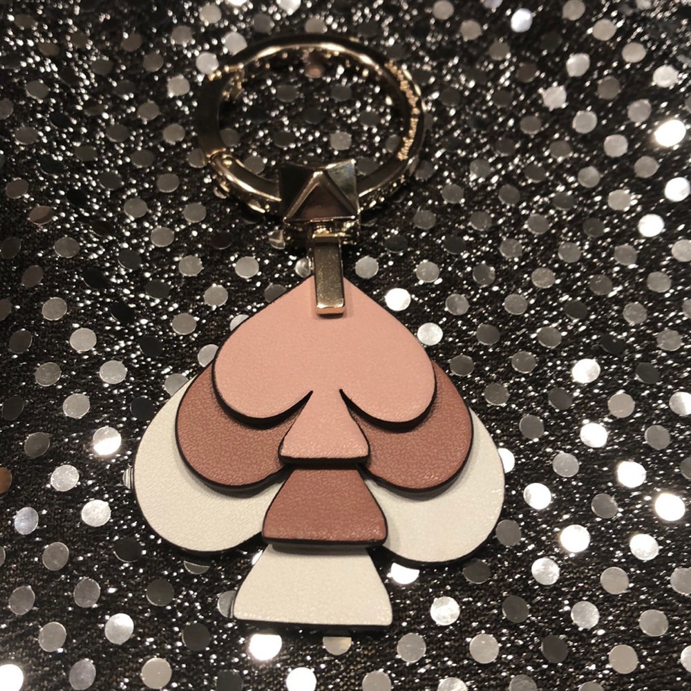 Kate spade purse keychain accessory.
